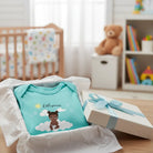 Personalized Little Princess or Little Prine baby bodysuit featuring custom baby character and magical fairytale artwork - Sapphire Onesie - In a gift box in a nursey