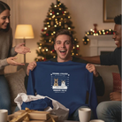 Person holding a Custom Embroidered Personal Pet 'Stalkers' Unisex Adult Sweatshirt Featuring Pet Dogs & Cats in blue in a festive living room.