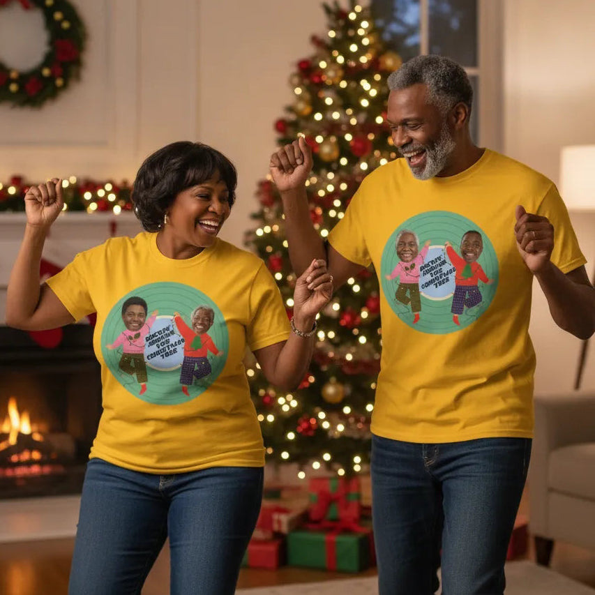 Two people wearing personalized Christmas T-shirt with custom photo faces and festive vinyl record design  yellow t-shirts, in a festive living room with a Christmas tree and wreath.